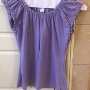 Light purple cap sleeve top.